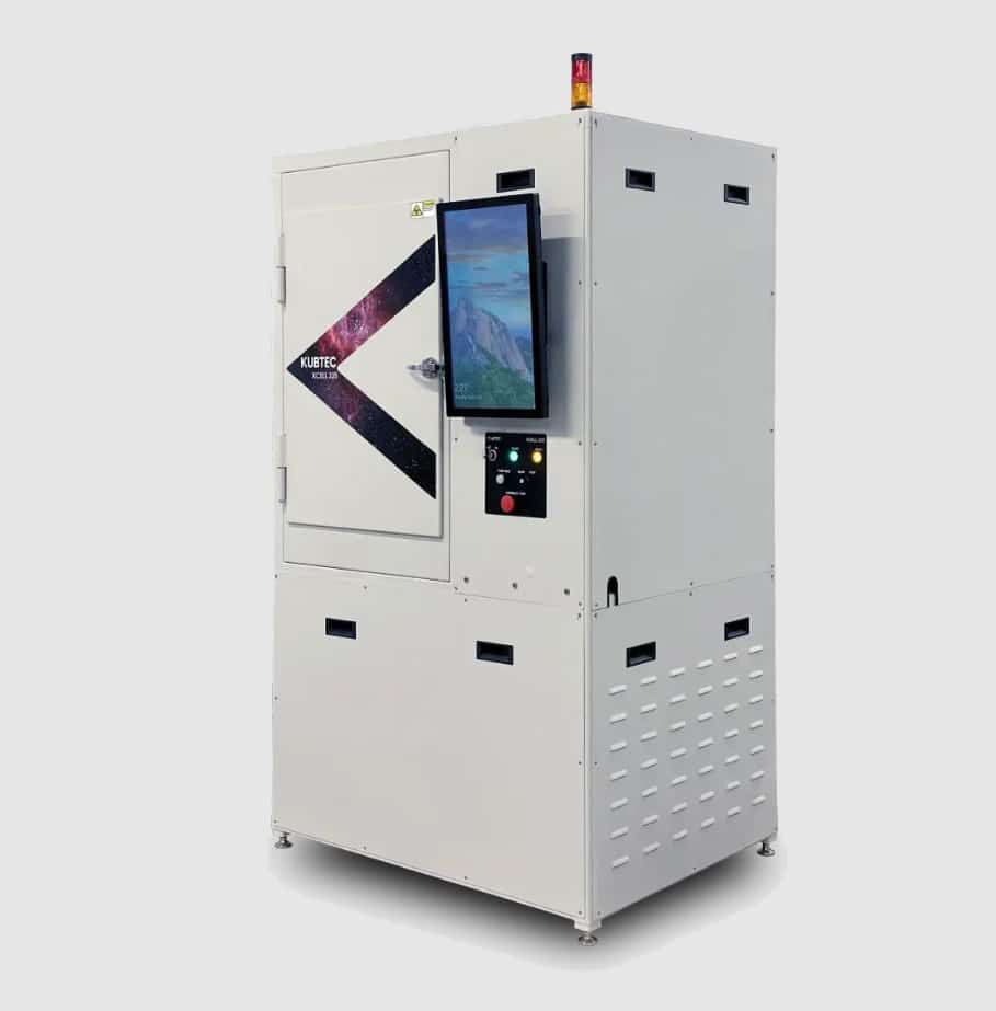 This image depicts the Kubtec XCELL, a free-standing X-ray irradiator, known for its versatility in laboratory settings. The device stands upright, with a prominent, user-friendly digital interface at the top front. Its sleek, modern design features a large, lead-lined irradiation chamber, visible through a LCD Display, allowing for the irradiation of larger samples or small animals. The irradiator is equipped with advanced safety features, including interlock systems to prevent accidental exposure to X-rays, and is typically used for biological and medical research applications.